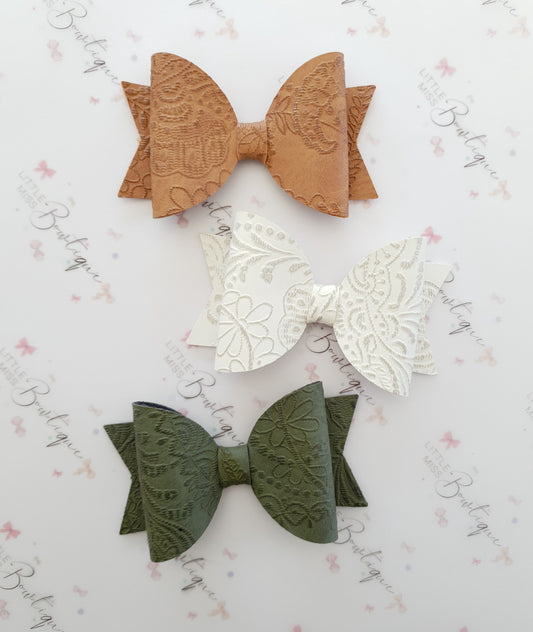 Embossed Faux Leather Bows